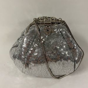 Small silver sequin evening pouch with handle